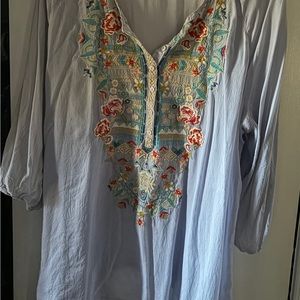 Johnny was light cotton embroidered blouse in great condition